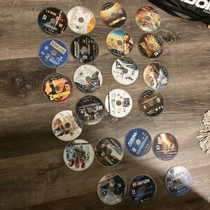 PS3 with 23 games and 2 controllers with charging cable and wires NO REFUND